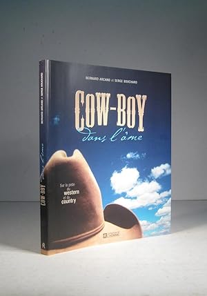 Imagen del vendedor de Cow-Boy dans l'me. Sur la piste du western et du country a la venta por Librairie Bonheur d'occasion (LILA / ILAB)