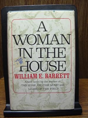 Seller image for A WOMAN IN THE HOUSE for sale by The Book Abyss