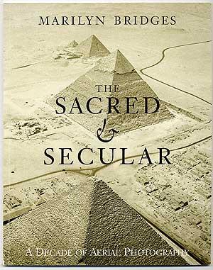 Bild des Verkufers fr The Sacred & Secular: A Decade of Aerial Photography zum Verkauf von Between the Covers-Rare Books, Inc. ABAA