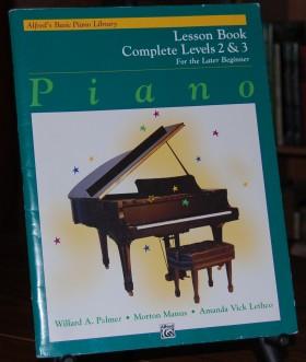 Alfred's Basic Piano Library Lesson Book for the Later Beginner Complete Levels 2 & 3.