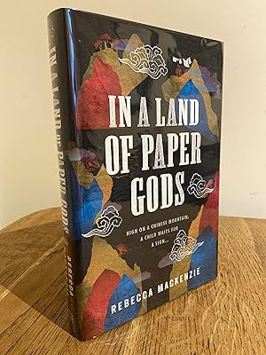 Image du vendeur pour In a Land of Paper Gods >>>> A SUPERB SIGNED & PREPUBLICATION DATED UK FIRST EDITION & FIRST PRINTING HARDBACK <<<< mis en vente par Zeitgeist Books