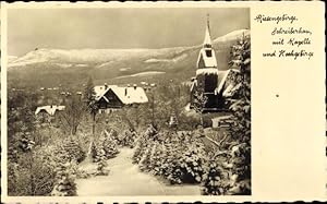 Seller image for Ansichtskarte / Postkarte Szklarska Schreiberhau Riesengebirge Schlesien, Ortsansicht, Kapelle, Schnee, Hochgebirge for sale by akpool GmbH