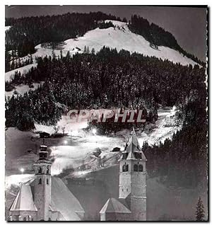 Bild des Verkufers fr Carte Postale Moderne Kitzbuhel Tirol bei Nacht mit beleuchteter Ganslern Abfahrts Piste zum Verkauf von CPAPHIL