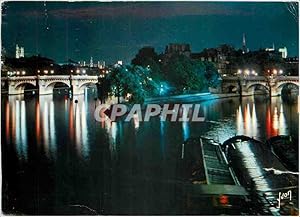 Imagen del vendedor de Carte Postale Ancienne Paris La Pointe du Vert Galant et le Pont Neuf illumines a la venta por CPAPHIL