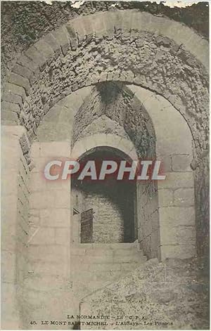 Seller image for Carte Postale Ancienne Le mont Sait Michel L'abbaye les prisons for sale by CPAPHIL