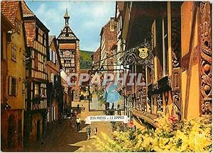 Carte Postale Moderne Riquewihr Haut Rhin Rue Principale Vieille maison avec bois de Fenetre scul...