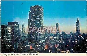 Seller image for Carte Postale Moderne New York City Night falls on Midtown Manhattan showing the RCA Building Chrysler Building and Empire State Building for sale by CPAPHIL