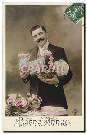 Immagine del venditore per Fantaisie - Bonne Anne - Handsome man - arms filled with prsents - Carte Postale Ancienne venduto da CPAPHIL