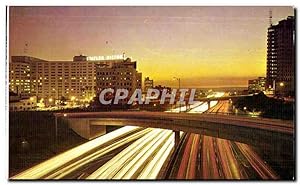 Seller image for Carte Postale Ancienne The Harbor Freeway At Dusk Los Angeles California for sale by CPAPHIL