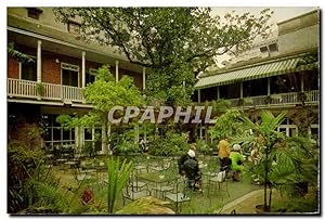 Seller image for Carte Postale Ancienne Patio Brennan's French Resturant Royal Street New Orleans New Orleans City of Enchantment for sale by CPAPHIL