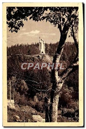 Imagen del vendedor de Carte Postale Ancienne Les Houches Le Christ Roi du Mont Blanc de G Serraz dans la fort de Coupeau a la venta por CPAPHIL