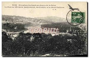 Carte Postale Ancienne Avion Aviation Aeroplane evoluant au dessus de la Seine Le pont de Sevres ...