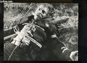 1 Photographie en noir et blanc de Burt Lancaster en shériff ligoté.