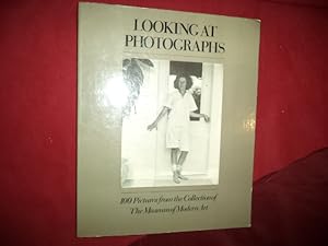 Image du vendeur pour Looking at Photographs. 100 Pictures from the Collection of The Museum of Modern Art. mis en vente par BookMine