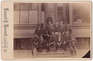 Lewiston, Me. Boys and Men Posing on Storefront cabinet card