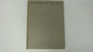 Seller image for A CAMERA IN THE HILLS for sale by Goldstone Rare Books