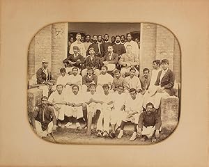 A vintage group photograph captioned 'Cricket Match Feb 02 Furreedpore' ['1902 Faridpur' in anoth...