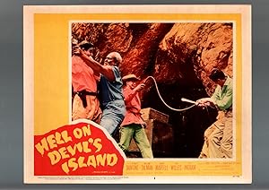 HELL ON DEVIL'S ISLAND-LOBBY CARD #3-1957-WHIPPING SCENE- VF