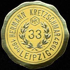 Bild des Verkufers fr Reklamemarke 33 Jahre Hermann Kretzschmar zum Verkauf von Veikkos