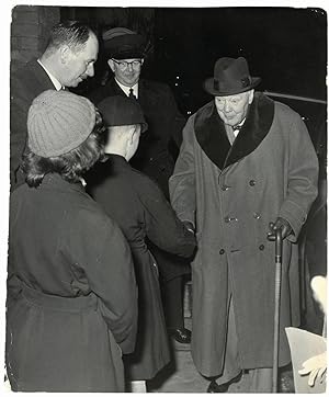 An original press photo of Sir Winston S. Churchill meeting the children of his bodyguard on 25 F...