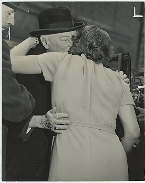 An original press photo of Sir Winston S. Churchill greeting and hugging his daughter, Mary, on 1...