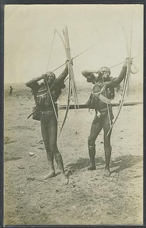 Real photo postcard of two Papua New Guinea tribesmen