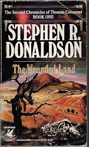 Seller image for THE WOUNDED LAND for sale by Books from the Crypt