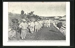 Ansichtskarte La Guerre Russo-Japonaise, une partie des 5000 coolies japonais faisant halte pre d...