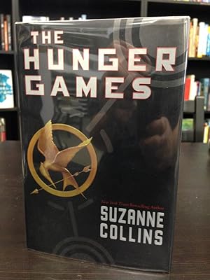 The Hunger Games - Lot Including First Printing, Advanced Reading Copy, and Collectible Bag Clip ...