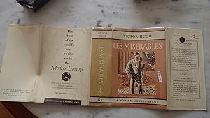 Image du vendeur pour Les Miserables by VICTOR HUGO, #G3 on DJ Spine, , Complete & UNABRIDGED in RARE SALMON & WHITE , lettered in Black EARLY BROWNSALMON & WHITE Dustjacket with Face & Shoulders LEGS of Downtrotten man on Front WITH CANE, MODERN LIBRARY GIANT mis en vente par Bluff Park Rare Books