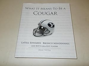 Seller image for What It Means to Be a Cougar: LaVell Edwards, Bronco Mendenhall and BYU's Greatest Players for sale by Paradise Found Books