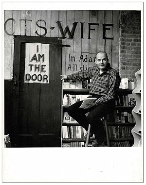 ORIGINAL PHOTOGRAPH OF LAWRENCE FERLINGHETTI IN THE BASEMENT OF CITY LIGHTS BOOKSTORE
