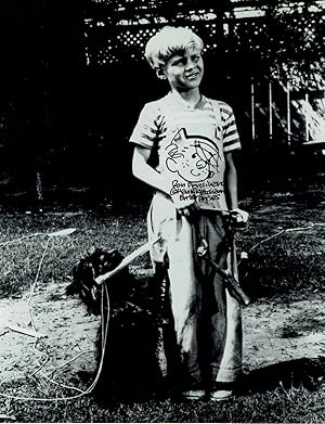 GLOSSY BLACK-AND-WHITE PHOTOGRAPH OF JAY NORTH'S "DENNIS THE MENACE" WITH A SIGNED ORIGINAL DRAWI...