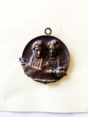 Einseitige Medaille aus Bronze mit dem Doppelportrait der beiden Komponisten von J. Weigl. Die Kö...