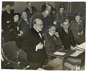 An original wartime press photograph of Prime Minister Winston S. Churchill speaking at the 27 Ma...