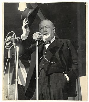 An original wartime press photograph of Prime Minister Winston S. Churchill on 3 July 1945, keepi...