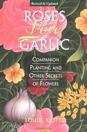 Seller image for Roses Love Garlic: Companion Planting and Other Secrets of Flowers by Riotte, Louise [Paperback ] for sale by booksXpress