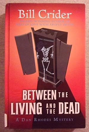 Seller image for Between the Living and the Dead: A Dan Rhodes Mystery, Large Print Edition for sale by Book Nook