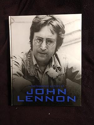 Seller image for THE PHOTOGRAPHIC HISTORY OF JOHN LENNON for sale by JB's Book Vault