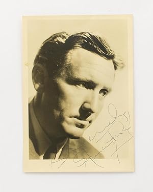 A portrait photograph inscribed and signed 'Sincerely, Spencer Tracy'