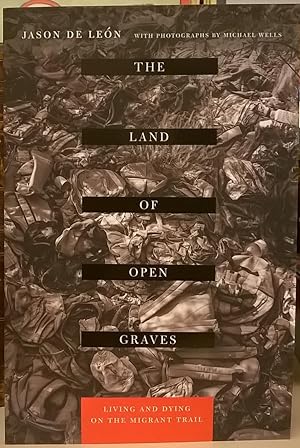 Seller image for The Land of Open Graves: Living and Dying on the Migrant Trail for sale by Moe's Books