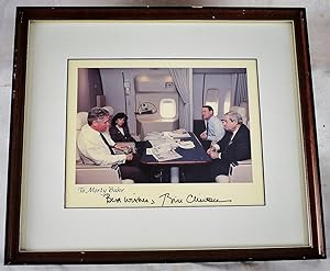 Framed photograph of President Bill Clinton on Air Force One, (Signed by Clinton)