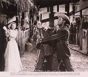 Evelyn Keyes, Glenn Ford, and Randolph Scott in  The Desperadoes , 1943.