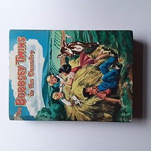 Seller image for The Bobbsey Twins in the Country for sale by Grandma Betty's Books