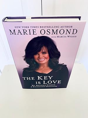 Imagen del vendedor de The Key is Love: My Mother's Wisdom, A Daughter's Gratitude [FIRST EDITION, FIRST PRINTING] a la venta por Vero Beach Books