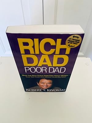 Imagen del vendedor de Rich Dad Poor Dad: What the Rich Teach Their Kids About Money - That the Poor and Middle Class Do Not! [FIRST EDITION, FIRST PRINTING] a la venta por Vero Beach Books