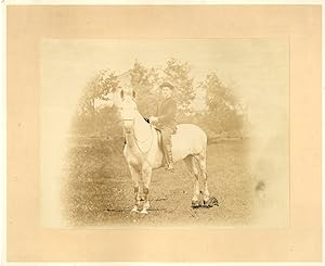 Cavalier et cheval blanc