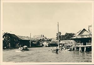 Indochine, Mékong, Bateaux et hangars sur pilotis, ca.1940, Vintage silver print