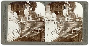 Stereo, Underwood & Underwood, European Publishers, Hindu pilgrims bathing in sacred well of thei...