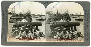 Stereo, Keystone View Company, Underwood & Underwood, A battery of old cannon on sea wall in fron...